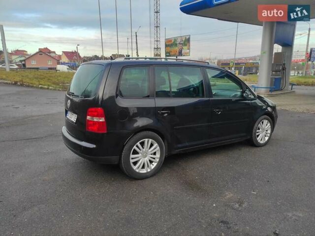 Черный Фольксваген Туран, объемом двигателя 2 л и пробегом 301 тыс. км за 6700 $, фото 14 на Automoto.ua