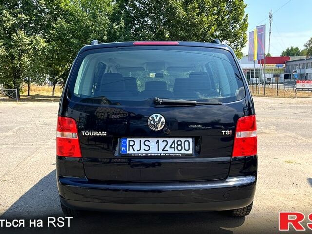 Черный Фольксваген Туран, объемом двигателя 1.4 л и пробегом 293 тыс. км за 3400 $, фото 3 на Automoto.ua