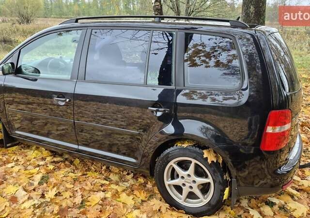 Черный Фольксваген Туран, объемом двигателя 1.39 л и пробегом 278 тыс. км за 5200 $, фото 4 на Automoto.ua