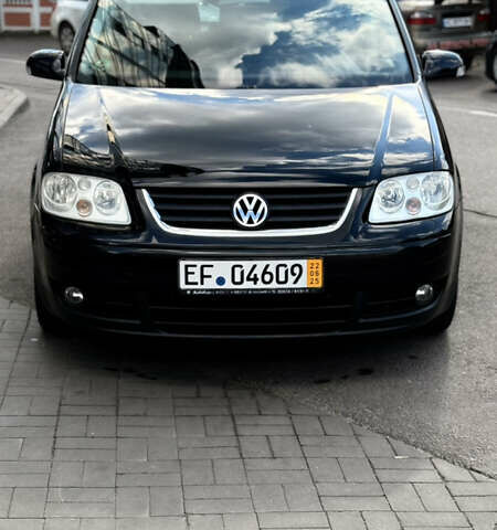 Черный Фольксваген Туран, объемом двигателя 1.6 л и пробегом 190 тыс. км за 6999 $, фото 63 на Automoto.ua