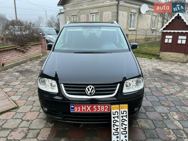 Черный Фольксваген Туран, объемом двигателя 1.6 л и пробегом 246 тыс. км за 5999 $, фото 11 на Automoto.ua