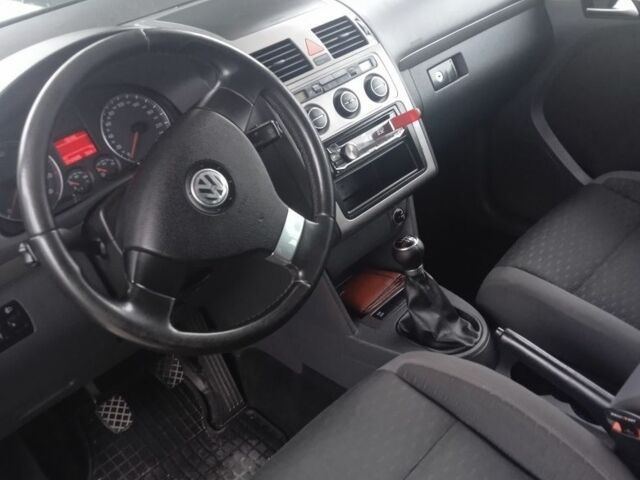 Черный Фольксваген Туран, объемом двигателя 1.4 л и пробегом 218 тыс. км за 6500 $, фото 5 на Automoto.ua