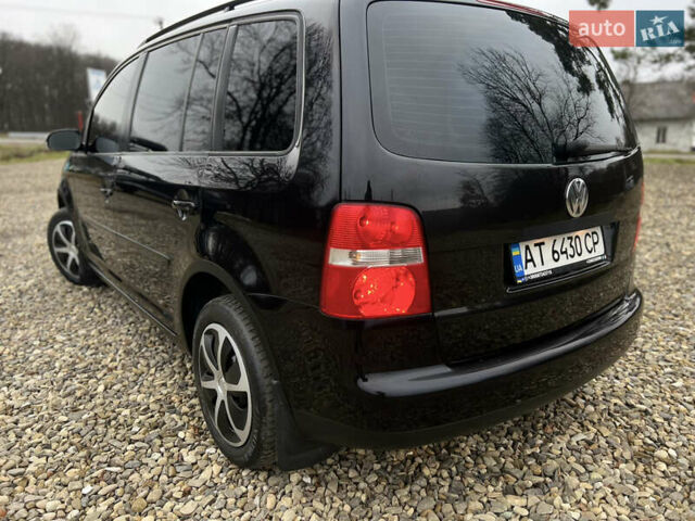 Черный Фольксваген Туран, объемом двигателя 1.9 л и пробегом 285 тыс. км за 6200 $, фото 13 на Automoto.ua