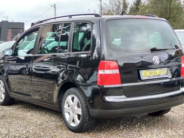 Черный Фольксваген Туран, объемом двигателя 1.6 л и пробегом 289 тыс. км за 5800 $, фото 3 на Automoto.ua