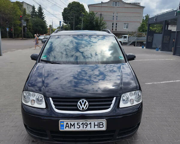 Черный Фольксваген Туран, объемом двигателя 1.9 л и пробегом 217 тыс. км за 7700 $, фото 2 на Automoto.ua