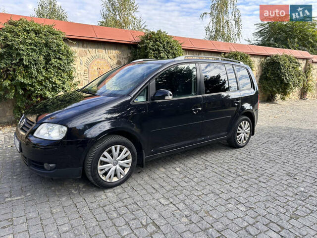 Черный Фольксваген Туран, объемом двигателя 2 л и пробегом 281 тыс. км за 5199 $, фото 2 на Automoto.ua