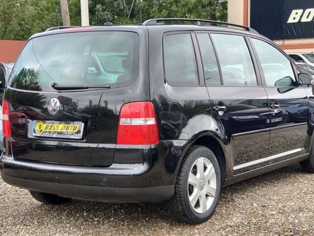 Черный Фольксваген Туран, объемом двигателя 1.6 л и пробегом 289 тыс. км за 5800 $, фото 5 на Automoto.ua