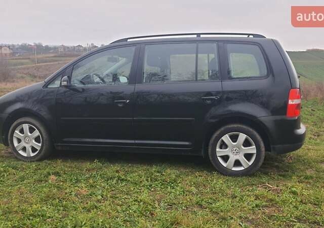 Черный Фольксваген Туран, объемом двигателя 1.6 л и пробегом 200 тыс. км за 5500 $, фото 5 на Automoto.ua