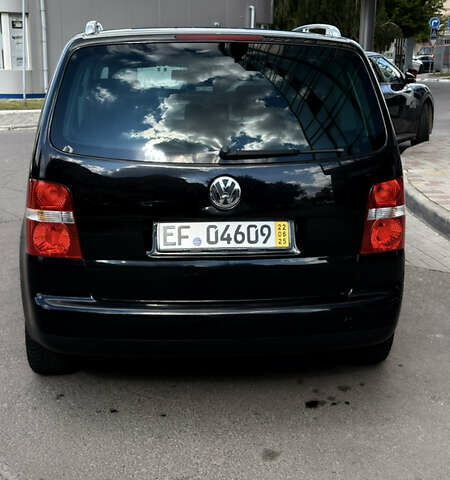 Черный Фольксваген Туран, объемом двигателя 1.6 л и пробегом 190 тыс. км за 6999 $, фото 75 на Automoto.ua
