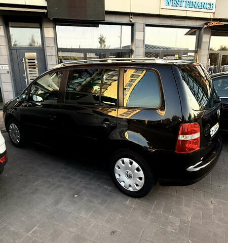 Черный Фольксваген Туран, объемом двигателя 1.6 л и пробегом 190 тыс. км за 6999 $, фото 12 на Automoto.ua