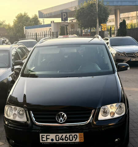 Черный Фольксваген Туран, объемом двигателя 1.6 л и пробегом 190 тыс. км за 6999 $, фото 11 на Automoto.ua