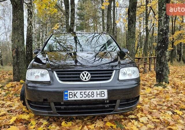 Черный Фольксваген Туран, объемом двигателя 1.39 л и пробегом 278 тыс. км за 5200 $, фото 9 на Automoto.ua