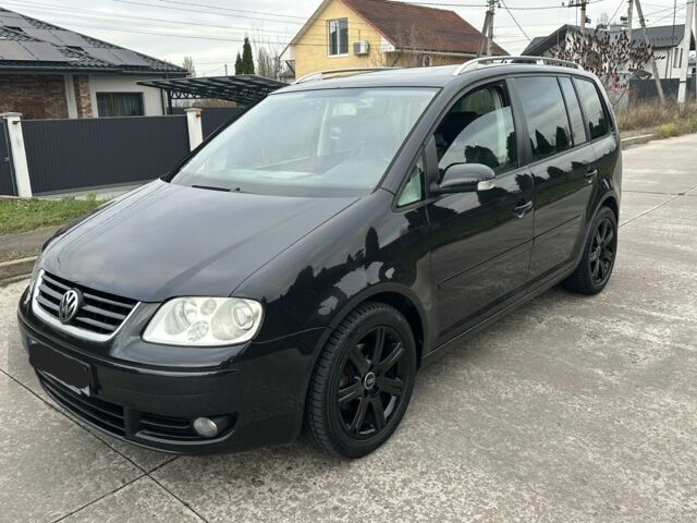 Черный Фольксваген Туран, объемом двигателя 2 л и пробегом 111 тыс. км за 4000 $, фото 5 на Automoto.ua