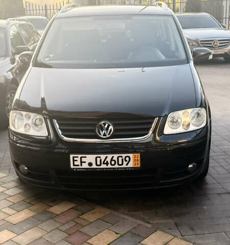 Черный Фольксваген Туран, объемом двигателя 1.6 л и пробегом 190 тыс. км за 6999 $, фото 20 на Automoto.ua