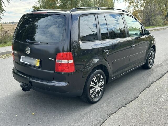 Черный Фольксваген Туран, объемом двигателя 1.9 л и пробегом 290 тыс. км за 3600 $, фото 3 на Automoto.ua