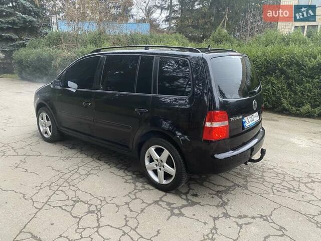 Чорний Фольксваген Туран, об'ємом двигуна 1.9 л та пробігом 390 тис. км за 6500 $, фото 3 на Automoto.ua