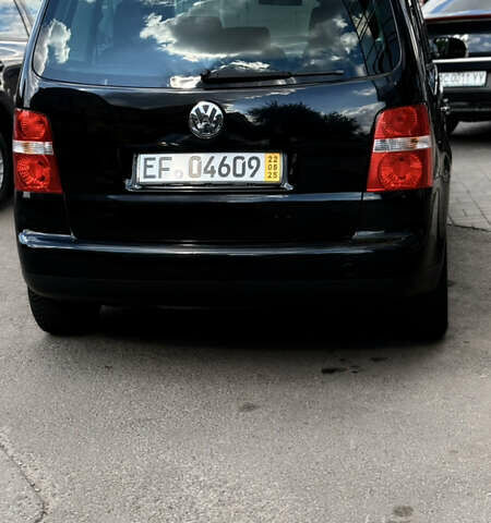 Черный Фольксваген Туран, объемом двигателя 1.6 л и пробегом 190 тыс. км за 6999 $, фото 59 на Automoto.ua