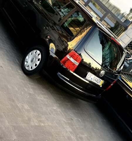 Черный Фольксваген Туран, объемом двигателя 1.6 л и пробегом 190 тыс. км за 6999 $, фото 14 на Automoto.ua