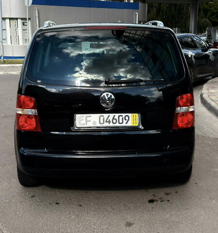Черный Фольксваген Туран, объемом двигателя 1.6 л и пробегом 190 тыс. км за 6999 $, фото 73 на Automoto.ua