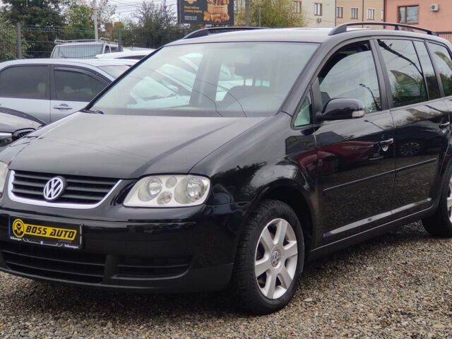 Черный Фольксваген Туран, объемом двигателя 1.6 л и пробегом 289 тыс. км за 5800 $, фото 2 на Automoto.ua