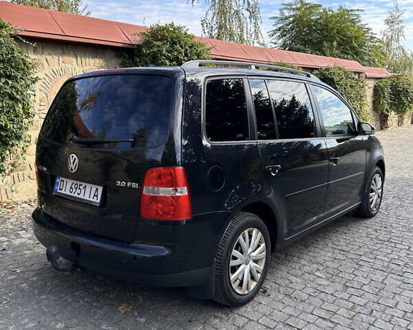Черный Фольксваген Туран, объемом двигателя 2 л и пробегом 281 тыс. км за 5199 $, фото 5 на Automoto.ua
