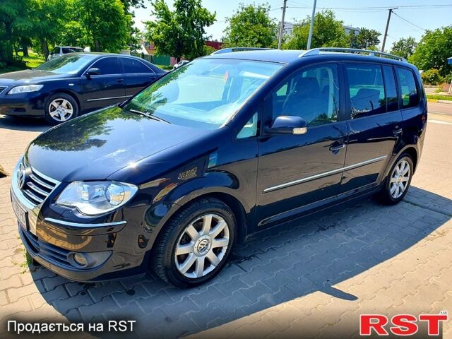 Черный Фольксваген Туран, объемом двигателя 1.4 л и пробегом 290 тыс. км за 5100 $, фото 12 на Automoto.ua