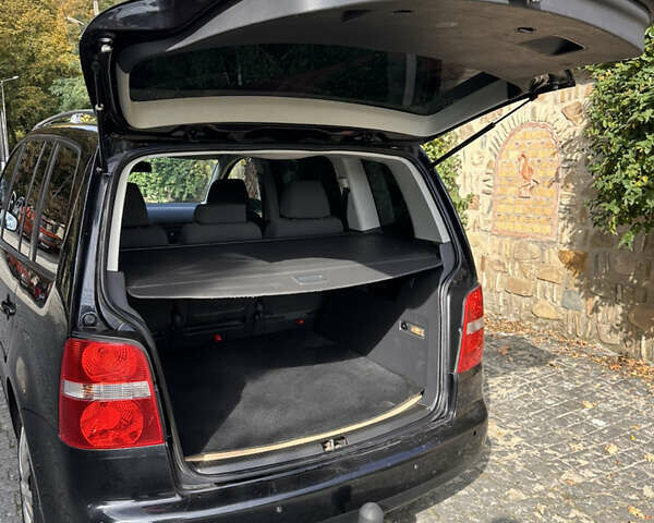 Черный Фольксваген Туран, объемом двигателя 2 л и пробегом 281 тыс. км за 5199 $, фото 7 на Automoto.ua