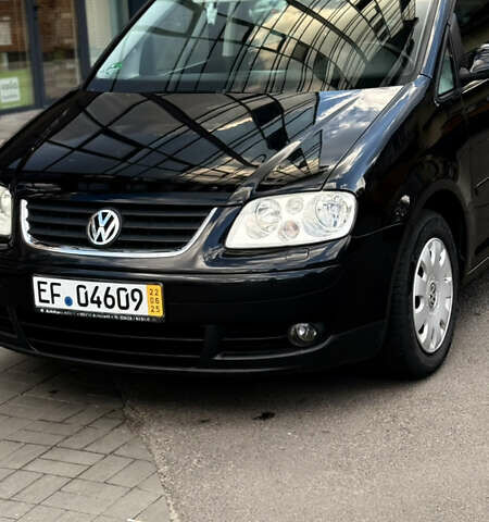 Черный Фольксваген Туран, объемом двигателя 1.6 л и пробегом 190 тыс. км за 6999 $, фото 50 на Automoto.ua