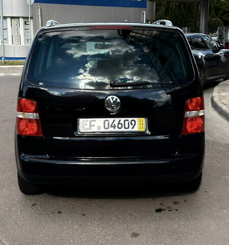 Черный Фольксваген Туран, объемом двигателя 1.6 л и пробегом 190 тыс. км за 6999 $, фото 77 на Automoto.ua
