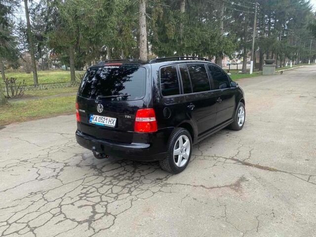 Чорний Фольксваген Туран, об'ємом двигуна 1.9 л та пробігом 290 тис. км за 6500 $, фото 4 на Automoto.ua