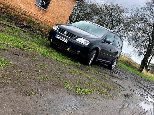 Черный Фольксваген Туран, объемом двигателя 2 л и пробегом 220 тыс. км за 7500 $, фото 2 на Automoto.ua