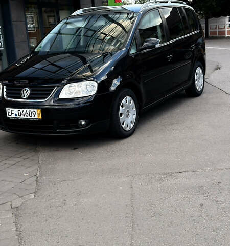 Черный Фольксваген Туран, объемом двигателя 1.6 л и пробегом 190 тыс. км за 6999 $, фото 48 на Automoto.ua