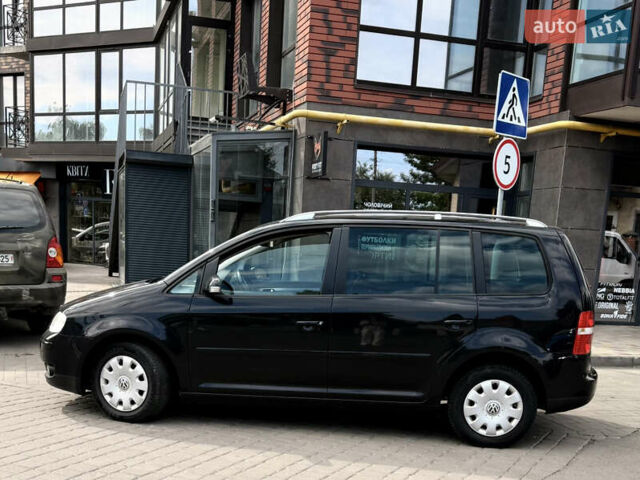 Черный Фольксваген Туран, объемом двигателя 1.6 л и пробегом 190 тыс. км за 6999 $, фото 6 на Automoto.ua