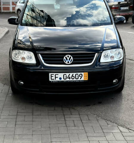 Черный Фольксваген Туран, объемом двигателя 1.6 л и пробегом 190 тыс. км за 6999 $, фото 65 на Automoto.ua