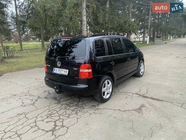 Чорний Фольксваген Туран, об'ємом двигуна 1.9 л та пробігом 390 тис. км за 6500 $, фото 4 на Automoto.ua