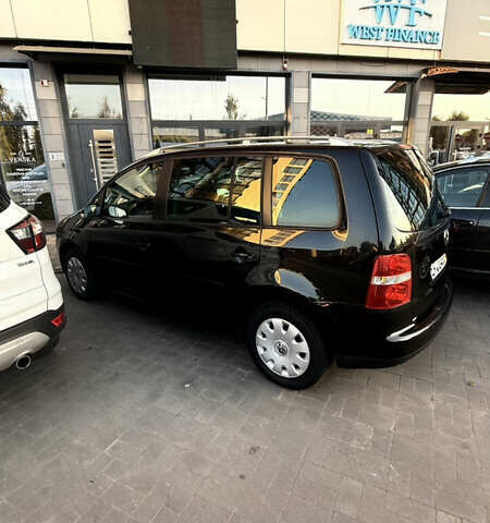 Черный Фольксваген Туран, объемом двигателя 1.6 л и пробегом 190 тыс. км за 6999 $, фото 13 на Automoto.ua