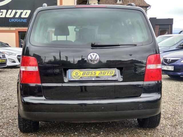 Черный Фольксваген Туран, объемом двигателя 1.6 л и пробегом 289 тыс. км за 5800 $, фото 4 на Automoto.ua
