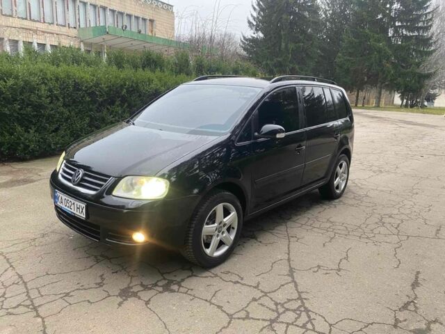 Чорний Фольксваген Туран, об'ємом двигуна 1.9 л та пробігом 290 тис. км за 6500 $, фото 2 на Automoto.ua