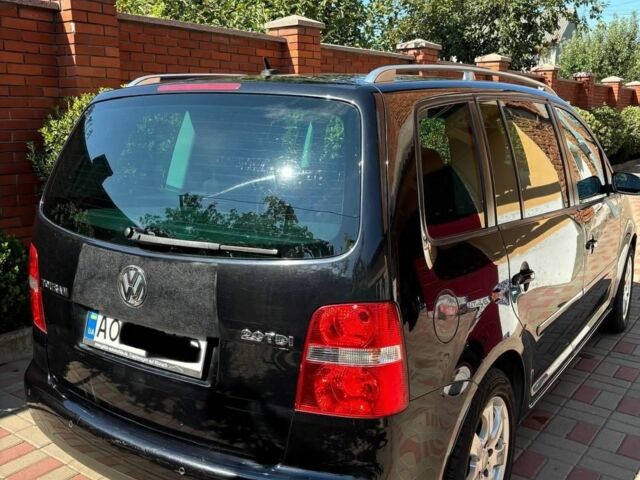 Черный Фольксваген Туран, объемом двигателя 0 л и пробегом 300 тыс. км за 6700 $, фото 1 на Automoto.ua