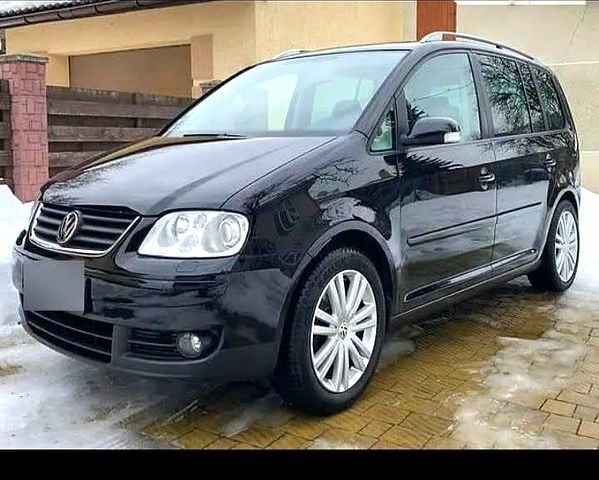 Черный Фольксваген Туран, объемом двигателя 2 л и пробегом 220 тыс. км за 7500 $, фото 3 на Automoto.ua
