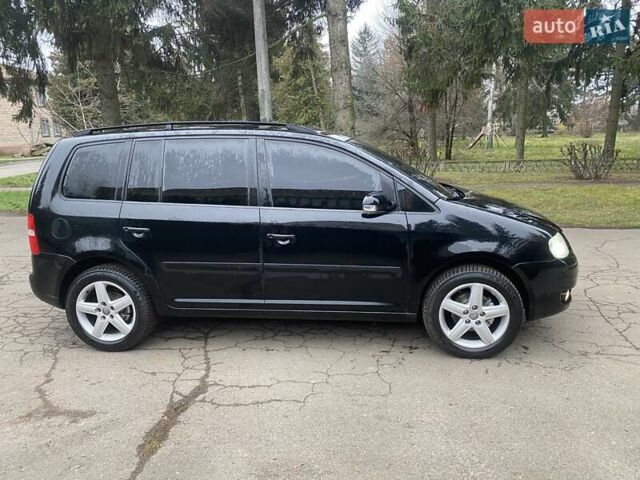 Чорний Фольксваген Туран, об'ємом двигуна 1.9 л та пробігом 390 тис. км за 6500 $, фото 5 на Automoto.ua