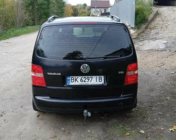 Черный Фольксваген Туран, объемом двигателя 1.6 л и пробегом 240 тыс. км за 5700 $, фото 8 на Automoto.ua
