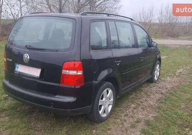 Черный Фольксваген Туран, объемом двигателя 1.6 л и пробегом 200 тыс. км за 5500 $, фото 8 на Automoto.ua