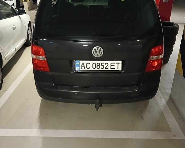 Чорний Фольксваген Туран, об'ємом двигуна 1.97 л та пробігом 291 тис. км за 7000 $, фото 3 на Automoto.ua