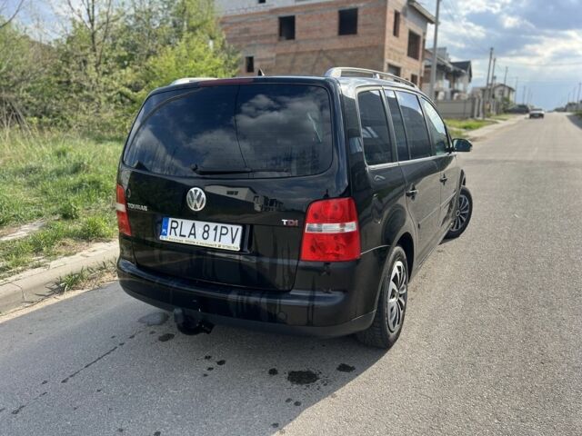 Черный Фольксваген Туран, объемом двигателя 1.9 л и пробегом 250 тыс. км за 3600 $, фото 3 на Automoto.ua
