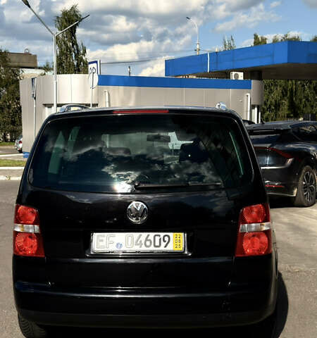 Черный Фольксваген Туран, объемом двигателя 1.6 л и пробегом 190 тыс. км за 6999 $, фото 79 на Automoto.ua