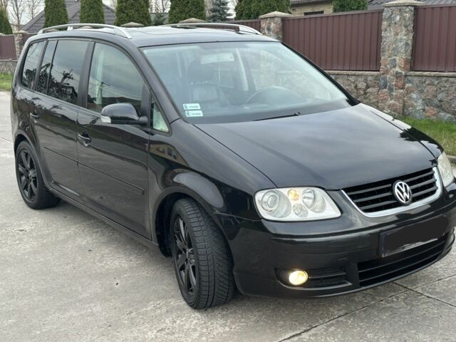 Черный Фольксваген Туран, объемом двигателя 2 л и пробегом 111 тыс. км за 4000 $, фото 1 на Automoto.ua