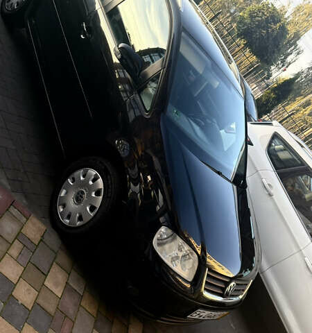 Черный Фольксваген Туран, объемом двигателя 1.6 л и пробегом 190 тыс. км за 6999 $, фото 21 на Automoto.ua