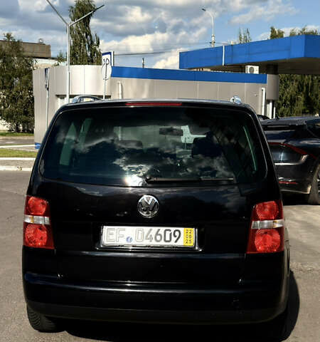 Черный Фольксваген Туран, объемом двигателя 1.6 л и пробегом 190 тыс. км за 6999 $, фото 72 на Automoto.ua