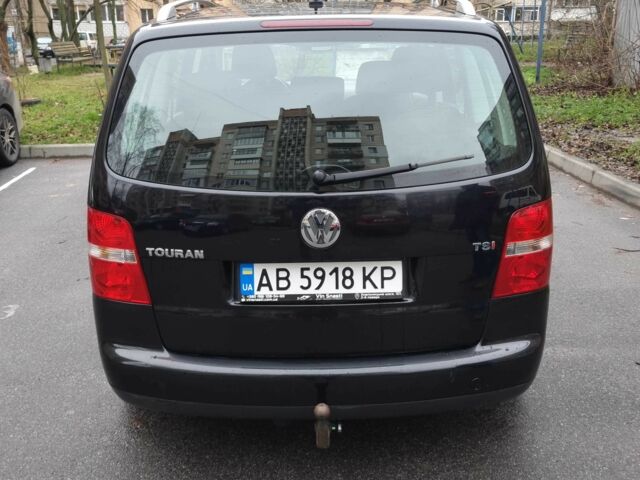 Черный Фольксваген Туран, объемом двигателя 1.4 л и пробегом 239 тыс. км за 5700 $, фото 4 на Automoto.ua